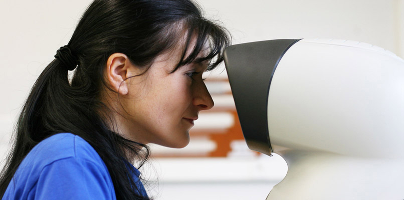 Image of woman inspecting